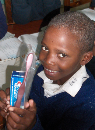 child with toothbrush