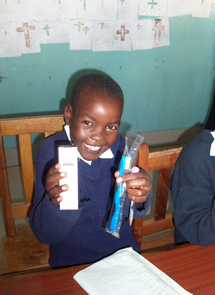2nd child with toothbrush