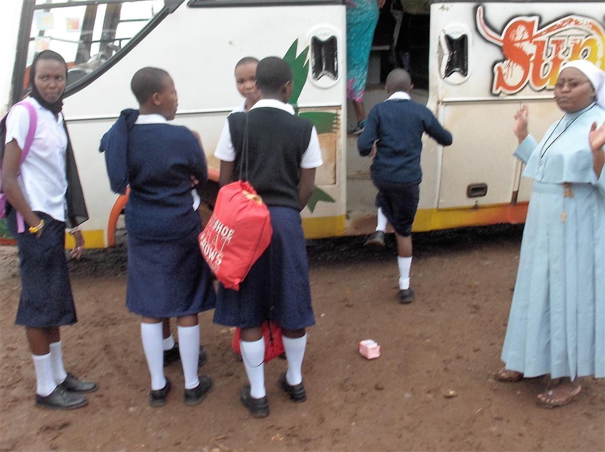 Girls board the bus