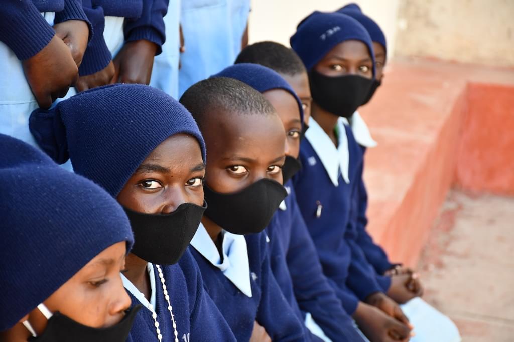 Group of St. Clare students with new face masks