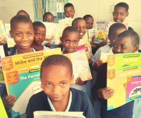 Kenyan girls hold new books