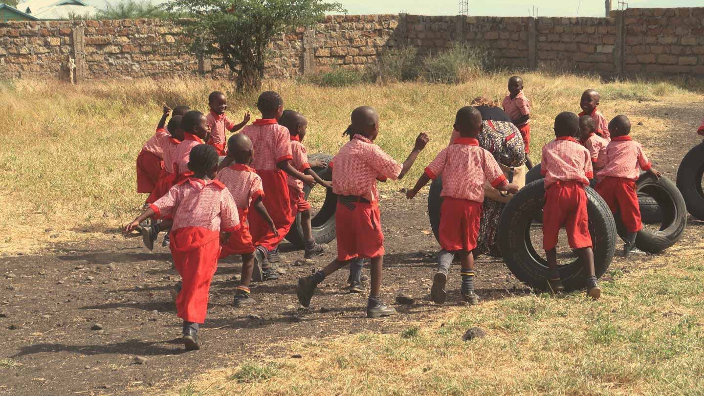 St. Clare girls rolling tires