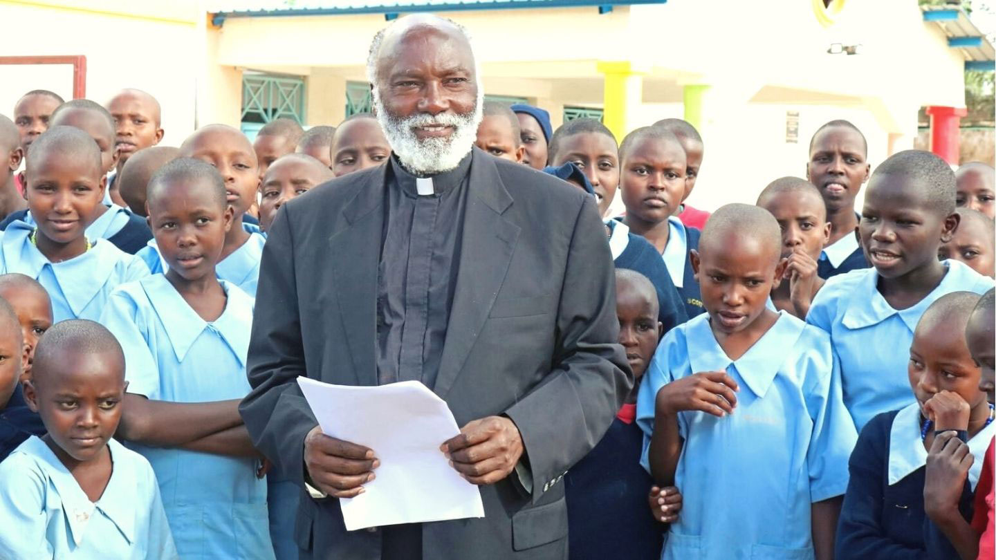 Father Riwa with the children