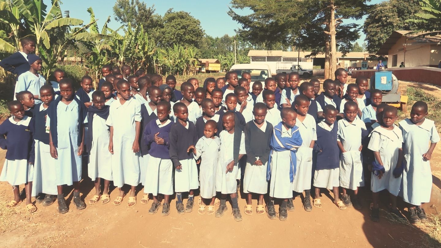a large group of Kenyan orphaned children